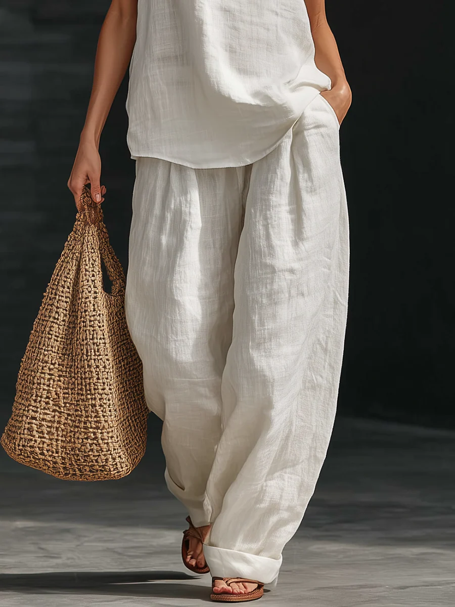 Nora, coordinato top con scollo halter e pantaloni a gamba larga