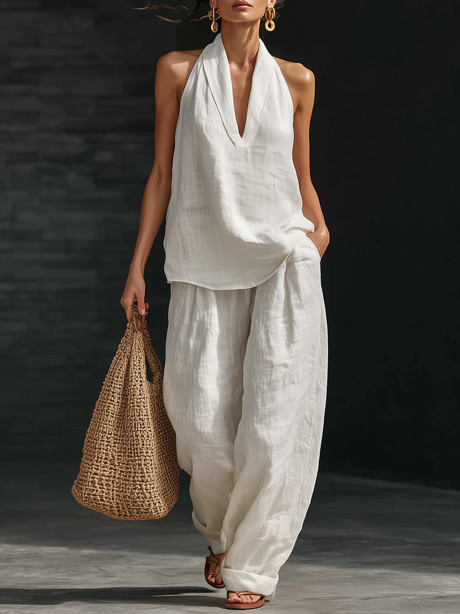 Nora, coordinato top con scollo halter e pantaloni a gamba larga, bianco