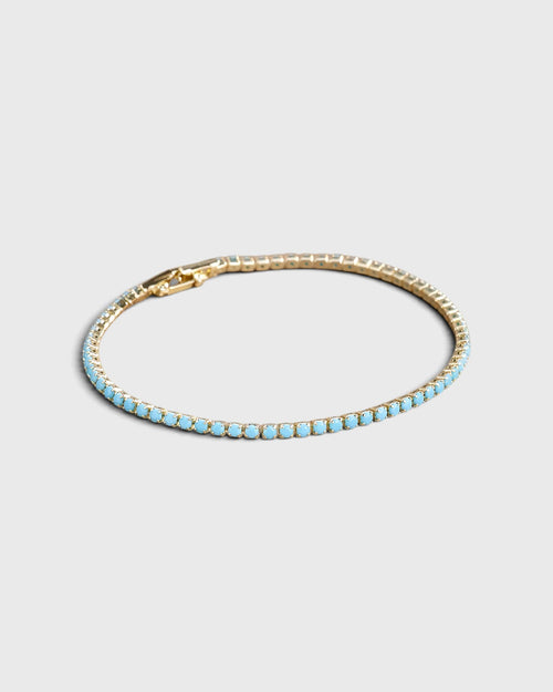 Bracciale tennis dorato con pietre turchesi