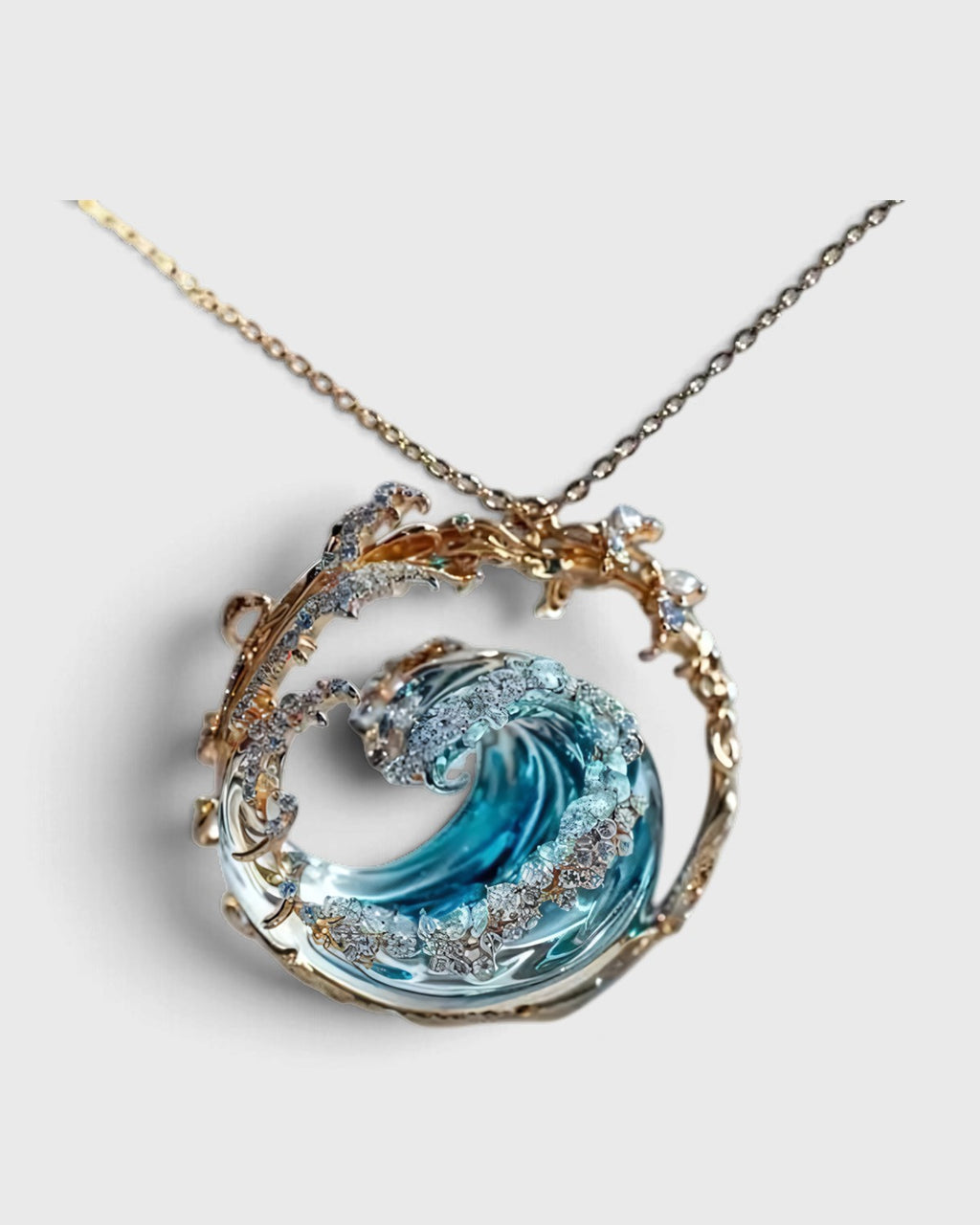 Collana con ciondolo a onda blu e dettagli dorati