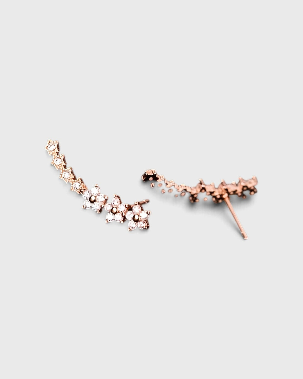 Orecchini a fiore in oro rosa con zirconi