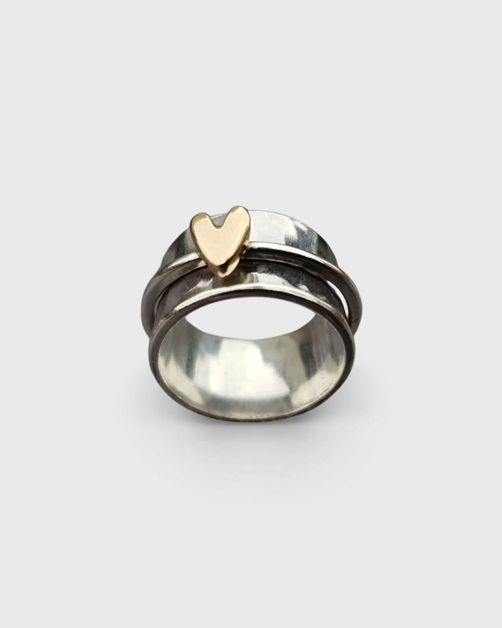 Anello in argento con cuore dorato