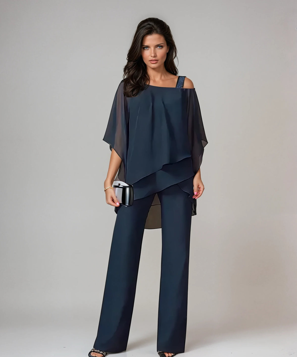 Adriana, coordinato con top asimmetrico a strati e pantaloni a gamba larga, blu navy