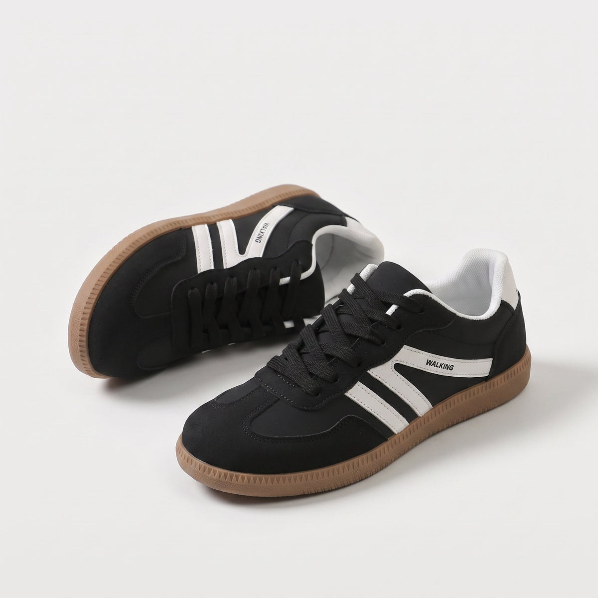 Delia | Sneakers basse con doppia banda laterale - Nero
